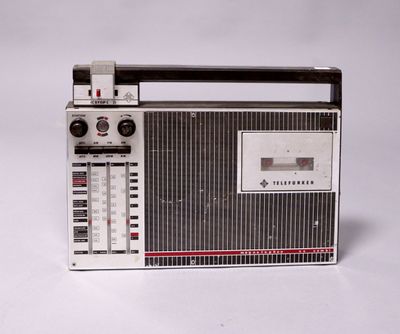 a radio that is sitting on a white surface