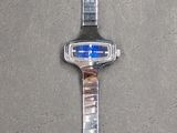 a watch that is laying on a table