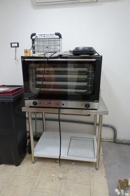 a microwave oven sitting on a table in a room