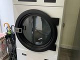 an image of a washing machine in a laundry room