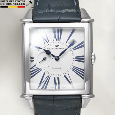 an image of a close up of a wrist watch with roman numerals
