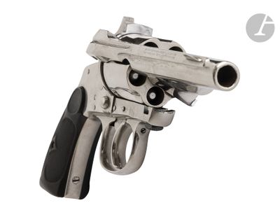 the gun is silver and black on a white background