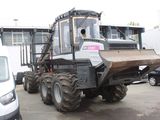 a large tractor that is parked in a parking lot
