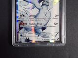 a close up of a pokemon card on a table