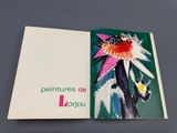 a book with a picture of a flower on it