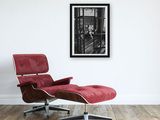 an image of a red chair and ottoman in a white room