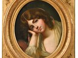portrait of a young woman in a gold frame