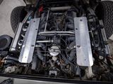 an overhead view of a car ' s engine bay with the hood open