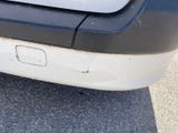 a close up of the front bumper of a car