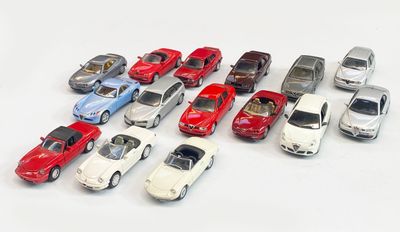 a lot of toy cars that are on the table