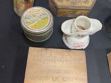 many different types of tins on display on a table