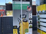 a yellow spray can sitting on a shelf in a store