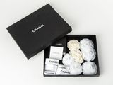 chanel gift set in a black box on a white background