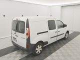a picture of a white van parked in a garage