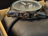 a watch that is sitting in a box on the table