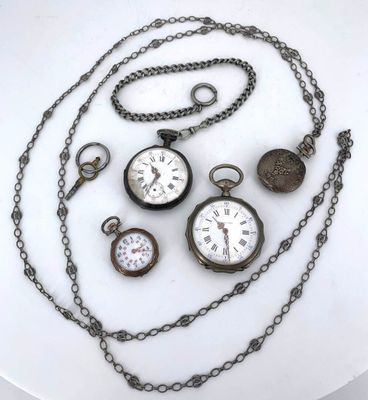a white plate with a bunch of different clocks on it