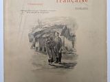 un vieux livre sur lequel figure l'image d'un homme et d'une femme marchant dans une rue