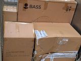 many boxes stacked on top of each other on the floor
