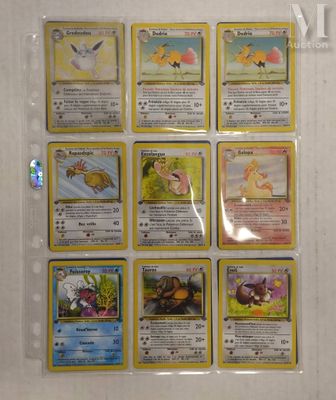 a lot of pokemon cards that are on the wall
