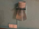 a light that is on on the wall next to a light