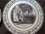two plates with a picture of a man and a woman on them