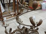 a chandelier that is sitting on the floor in the room