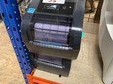 a machine that is sitting on a shelf in a store