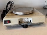 an image of an old record player on a table