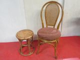 two chairs and a stool sitting on a red floor