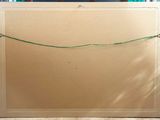 a picture of a picture of a box with a string attached to it