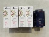 quatre boîtes de produits de soin du visage posées sur un comptoir