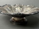 a glass bowl that is sitting on a table