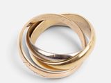 an image of a close up of a gold ring on a white background