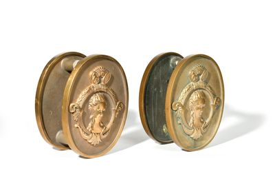 pair of brass plated cufflinks with a man and woman on them