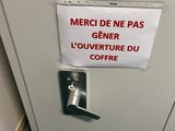 a door with a sign on it that says merci de ne pas