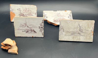 three pieces of paper with drawings on them sitting on a table