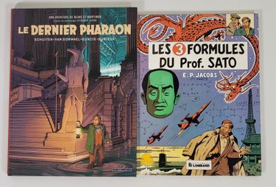 deux livres posés sur une table blanche, avec une image représentant un homme et un dragon