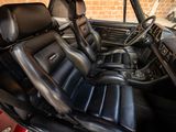 a picture of the interior of a car with leather seats