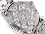 a close up of a watch on a white surface