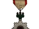 une image représentant une médaille sur laquelle figurent une croix et une étoile