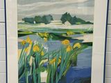 painting of yellow flowers in front of a white brick wall