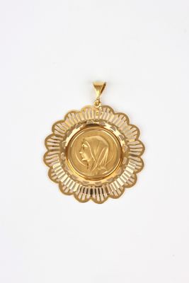 a close up of a gold medal on a white background
