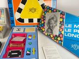 a box with a game on top of it and a box with a picture of a woman on it