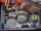 a pile of assorted items sitting in a bin