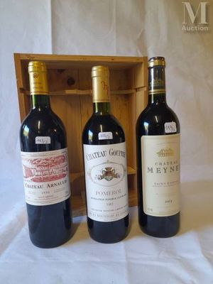 three bottles of wine sitting next to each other on a table