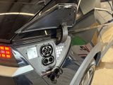 a close up of a car ' s rear end with its lights on