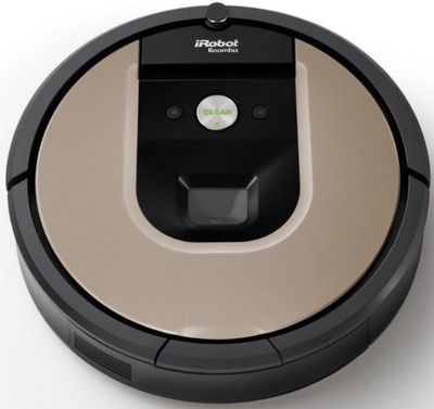 gros plan d'un aspirateur robotisé sur une surface blanche