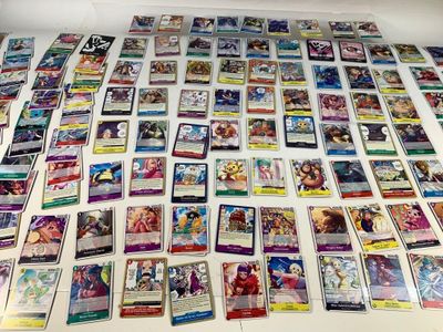 many different types of pokemon cards on the table