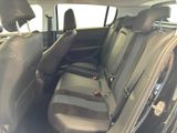 the back seats of a car are empty and the passenger seat is empty