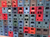 many crates stacked on top of each other in a room